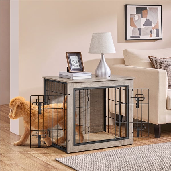 Hund betritt eine Hundebox im Beistelltisch-Design im Wohnzimmer.