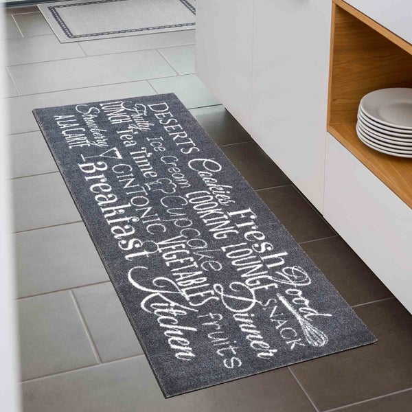 Graue Küchenmatte mit Schriftzug und verschiedenen Motiven