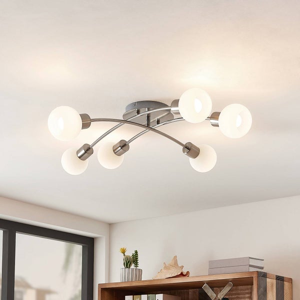 Deckenleuchte mit sechs Leuchten und geschwungenen Armen im Raum