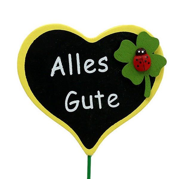 Dekoratives Herz mit der Aufschrift 'Alles Gute', verziert mit einem vierblättrigen Kleeblatt und Marienkäfer.