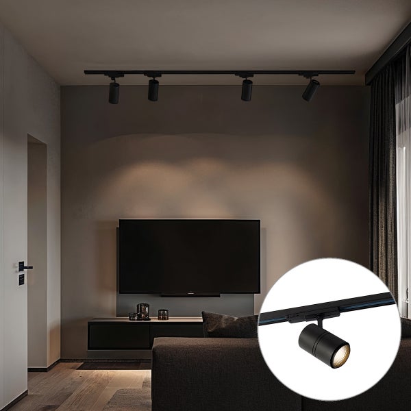 Modernes Wohnzimmer mit schwarzem Schienensystem an der Decke über einem Fernseher. Zylindrische Strahler im minimalistischen Design.