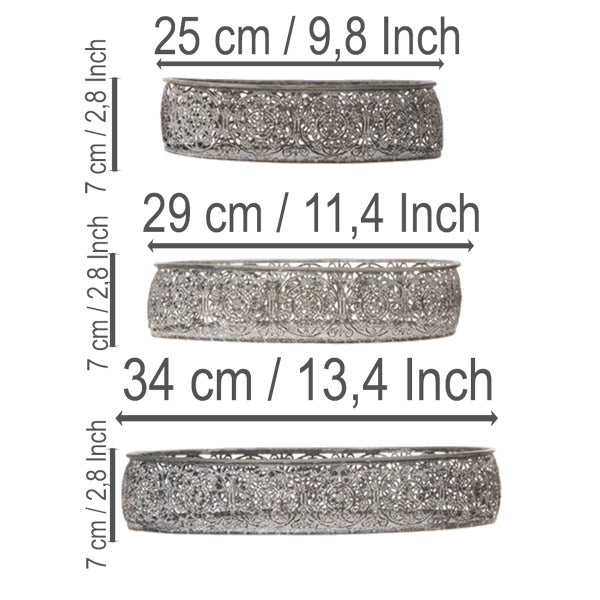 Set aus drei runden Metallschalen mit filigranem Muster, Durchmesser 25, 29 und 34 Zentimeter, Höhe 7 Zentimeter.