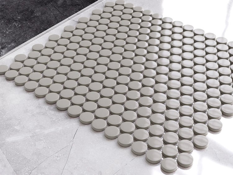 Mosaikfliese mit runden Steinen