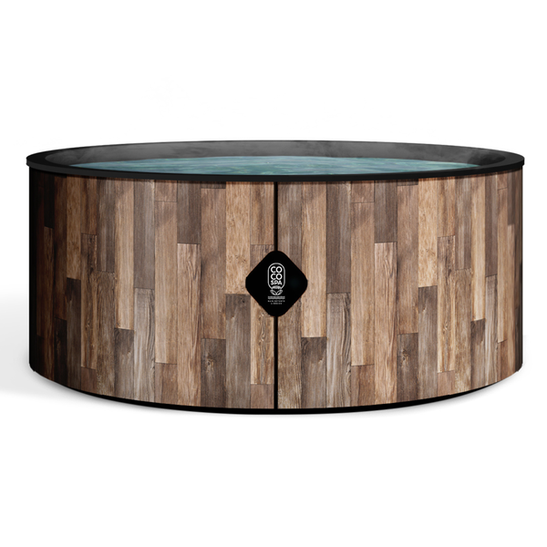 Runder Whirlpool mit Verkleidung in Holzoptik und COCO SPA Logo.