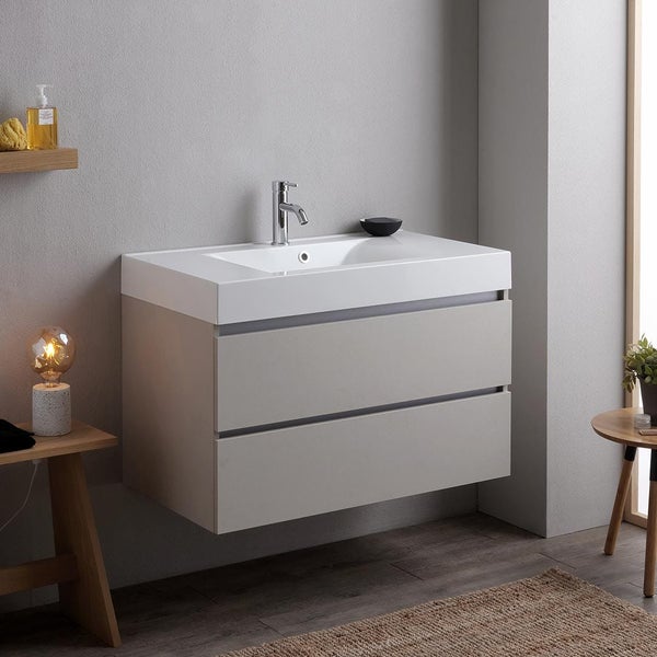 Waschtisch mit zwei Schubladen, Armatur und Waschbecken in einem Badezimmer