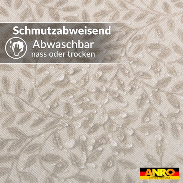 Schmutzabweisende und nass oder trocken abwaschbare Oberfläche auf Stoff mit Blattmuster. ANRO Deutsche Manufaktur Logo.
