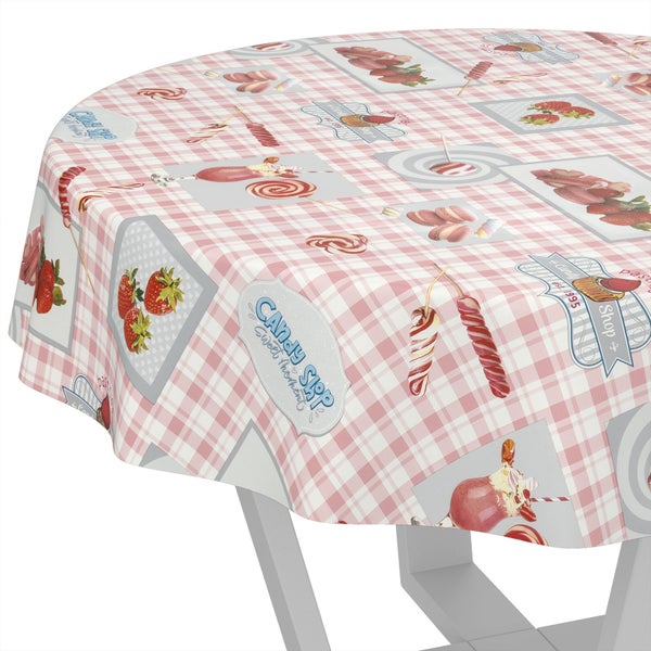 Runde Wachstischdecke mit Karomuster und Motiven von Süßigkeiten wie Erdbeeren, Macarons und Lutschern.