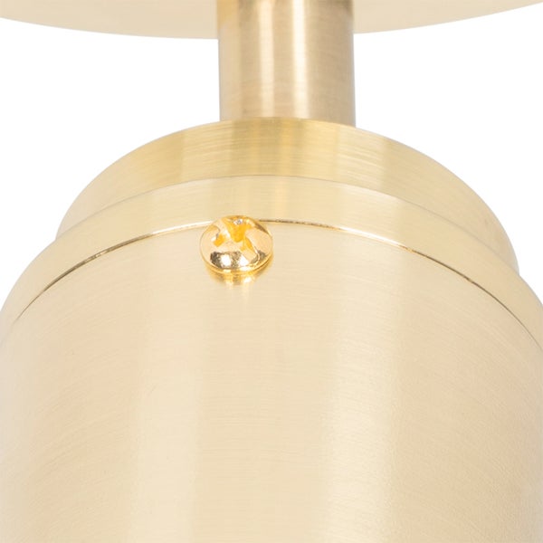 Detailaufnahme einer goldenen Deckenleuchte