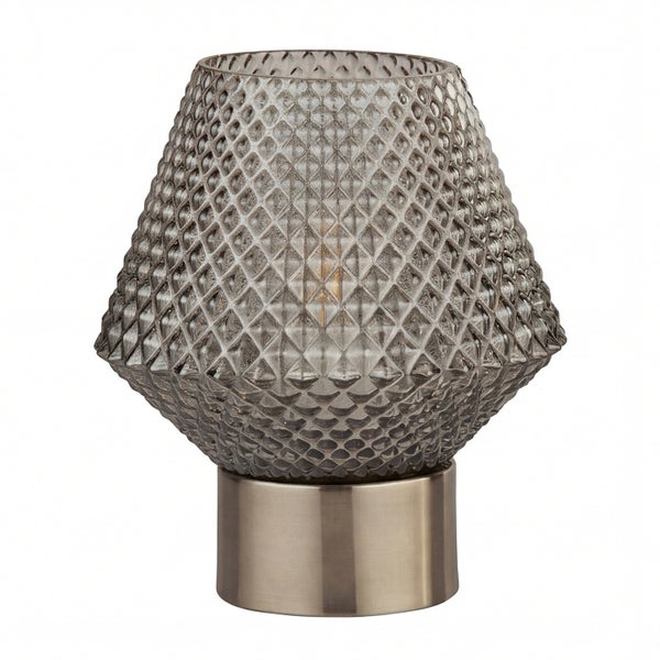 Tischleuchte mit gemustertem Glasschirm und Metallfuß