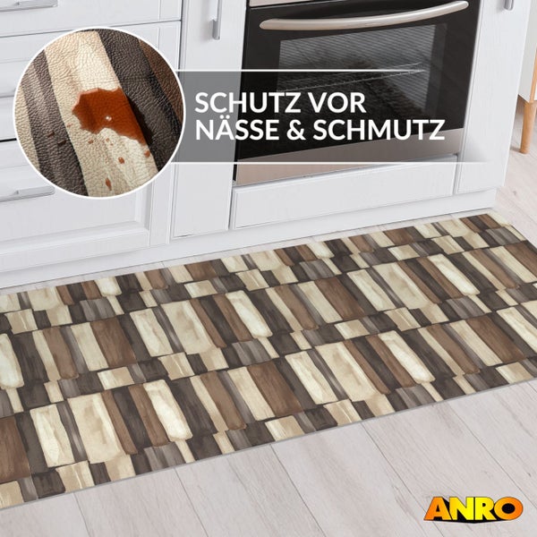 Küchenläufer mit geometrischem Muster vor weißer Küchenzeile. Detailansicht zeigt Schutz vor Nässe und Schmutz. ANRO Logo.