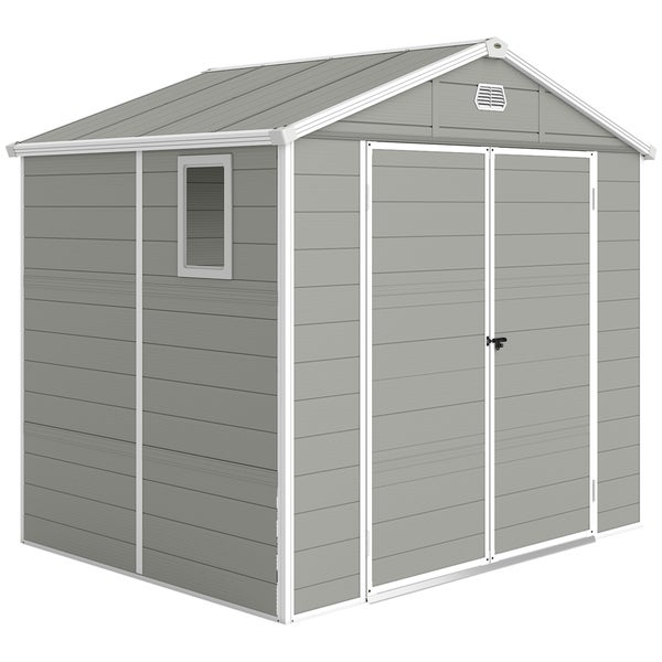 Terrassenüberdachung aus Metall mit dunklem Pultdach, darunter eine Polyrattan-Ecklounge mit dunklen Polstern und Tisch.