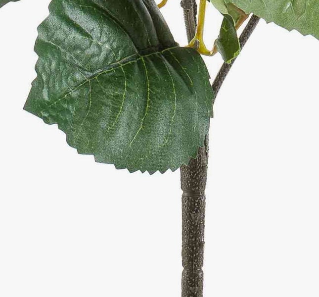 Nahaufnahme einer Kunstpflanze mit grünem Blatt und strukturiertem braunem Stiel.
