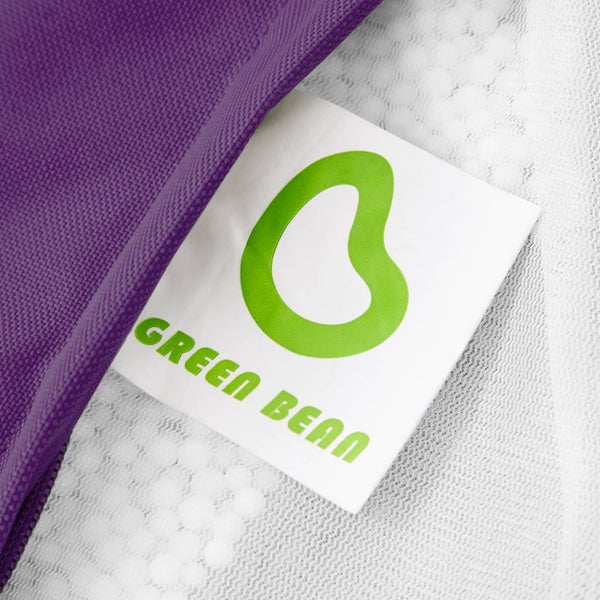Produktetikett mit Green Bean Logo an einem Textilartikel.