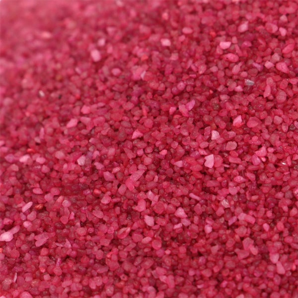 Dekorativer Sand mit feiner Körnung in Pink.