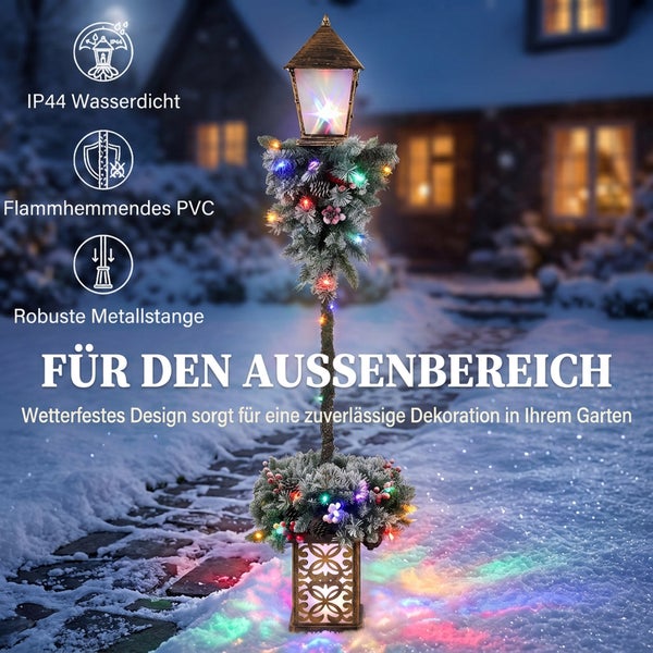 Beleuchtete Weihnachtsstraßenlaterne mit Tannengrün für den Außenbereich, wetterfest mit Schutzart IP44, flammhemmendem Material und Metallgestell.