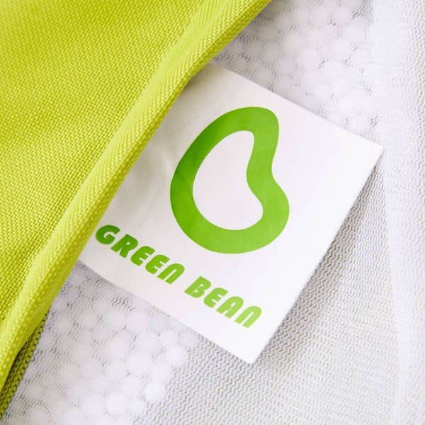 Produktetikett mit dem Green Bean Logo an einem textilen Artikel