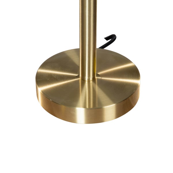 Detailaufnahme des runden Sockels einer Stehlampe aus Metall