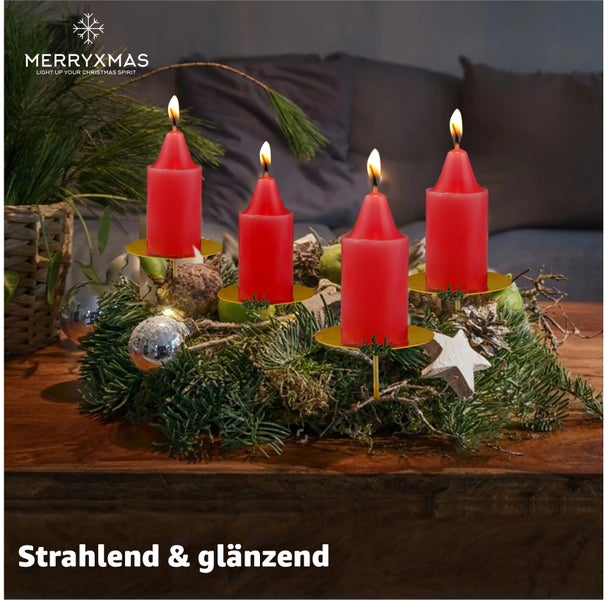 Adventskranz mit vier brennenden, roten Kerzen