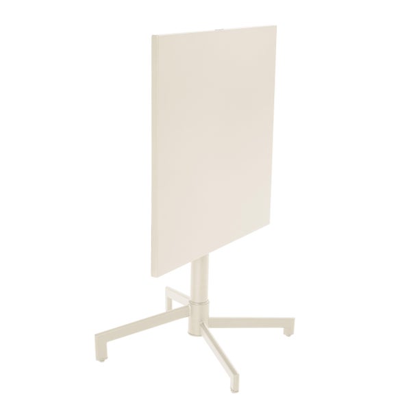 Cremefarbener Bistrotisch mit abklappbarer rechteckiger Tischplatte und vierbeinigem Säulengestell.