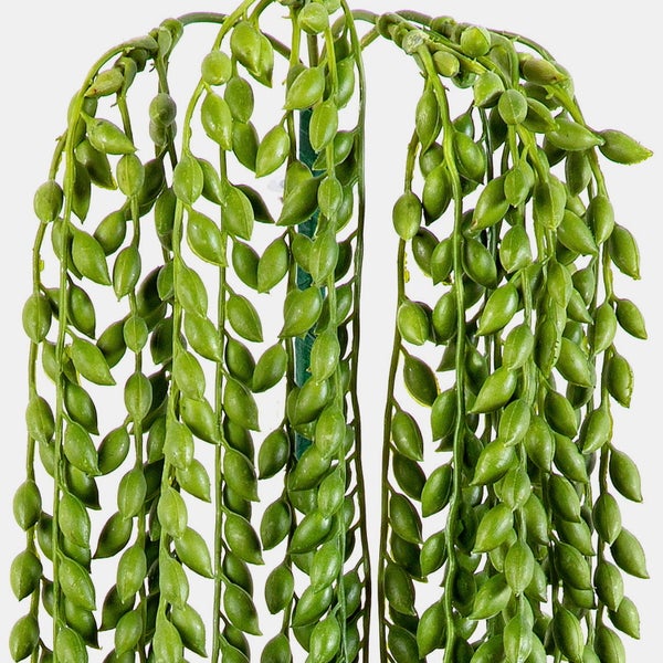 Künstliche Ranunkel Kunstblume mit rosa-violetten Blütenblättern und grünem Stängel