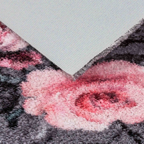 Detailansicht der Teppichunterseite mit Flor und Rosenmuster