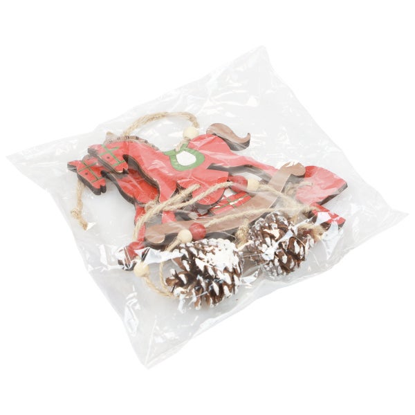 Verpackung mit Dekorationen: Holzpferd und Zapfen