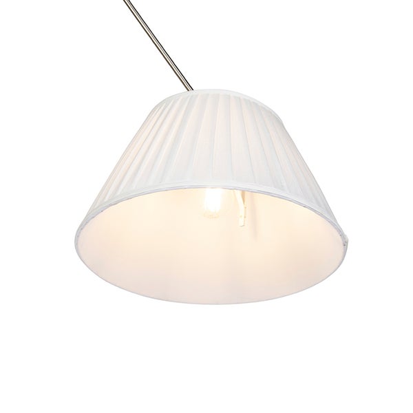 Plissierter Lampenschirm in konischer Form, beleuchtet, an einem Metallstab befestigt.