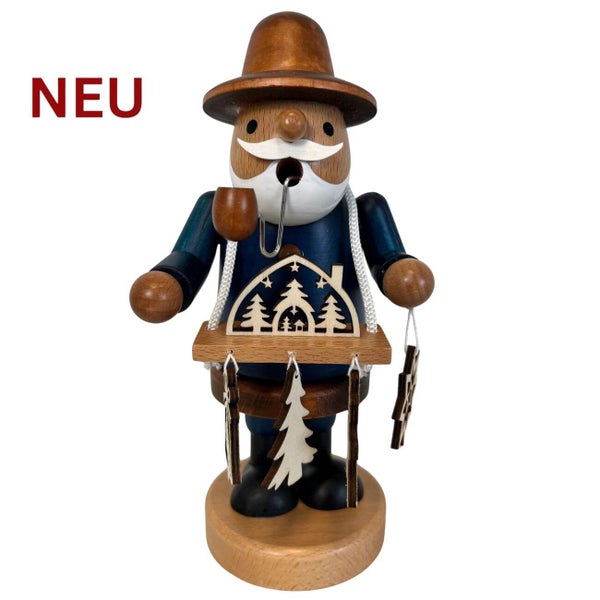 Räuchermann aus Holz mit Hut, Pfeife und weihnachtlicher Dekoration als Dekofigur für die Weihnachtszeit
