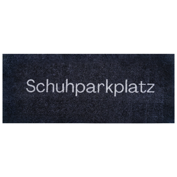 Fußmatte aus Polyamid mit dem Schriftzug Schuhparkplatz, rechteckig.