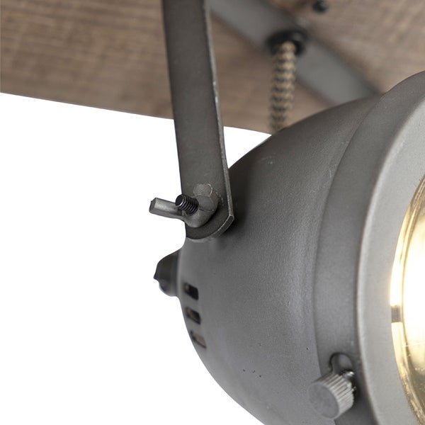 Nahaufnahme einer Deckenleuchte mit Holzdetails und industriellem Design