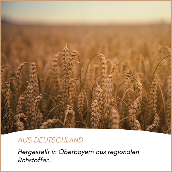 Weizenfeld mit dem Hinweis: Hergestellt in Oberbayern aus regionalen Rohstoffen.