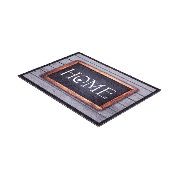 Fußmatte mit der Aufschrift Home