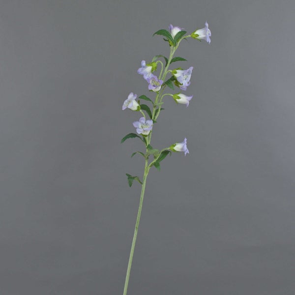Künstliche Glockenblume mit lila und weißen Blüten an einem grünen Stiel.
