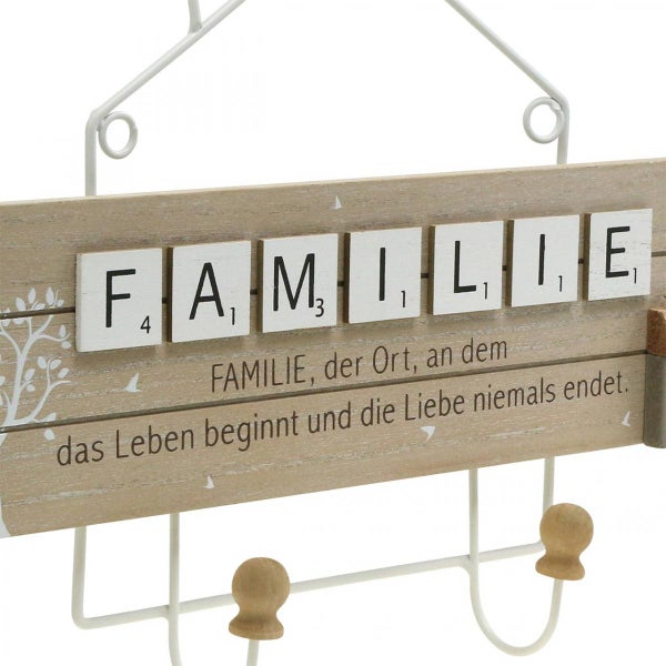 Dekoratives Holzschild mit dem Schriftzug Familie und Hakenleiste