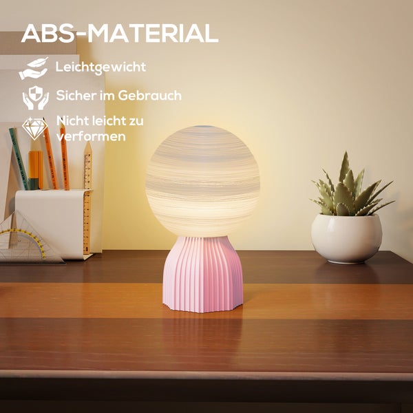 Moderne Tischleuchte aus ABS-Material auf einem Schreibtisch, leichtgewichtig, sicher im Gebrauch und formstabil.