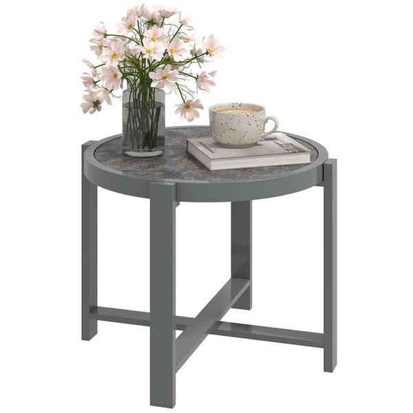 Runder Beistelltisch mit Blumen, Tasse und Buch