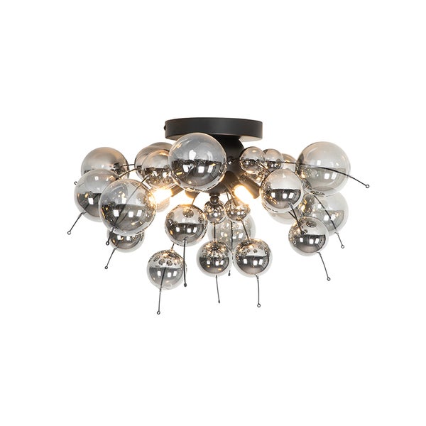 Deckenleuchte mit mehreren Glaslampenschirmen in Kugelform