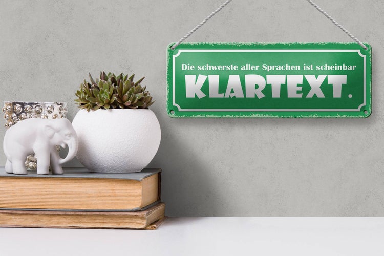 Blechschild Spruch 27x10cm die schwerste Sprache Klartext Dekoration