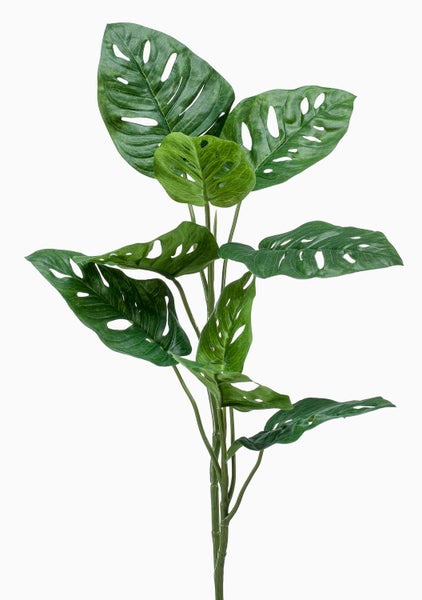 Künstliche Pflanze Monstera Adansonii mit detailgetreuen grünen Blättern und charakteristischen Löchern.