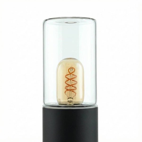 Dekorative Tischleuchte mit Glühbirne in Glaszylinder