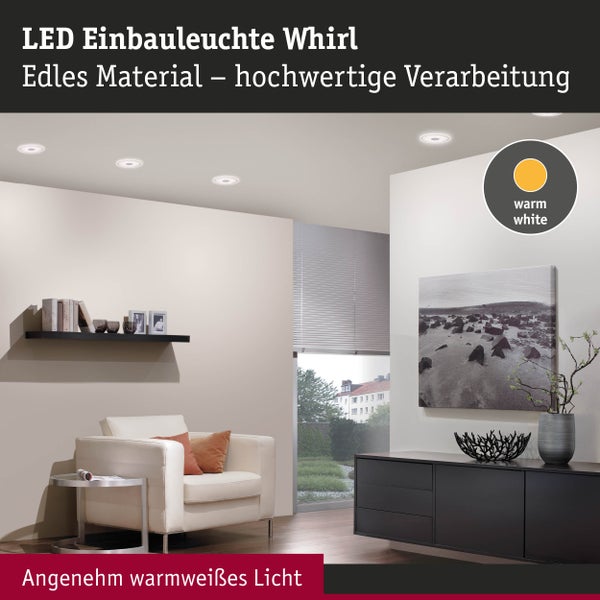 Mehrere LED Einbauleuchten Whirl in der Decke eines modernen Wohnzimmers sorgen für angenehm warmweißes Licht.