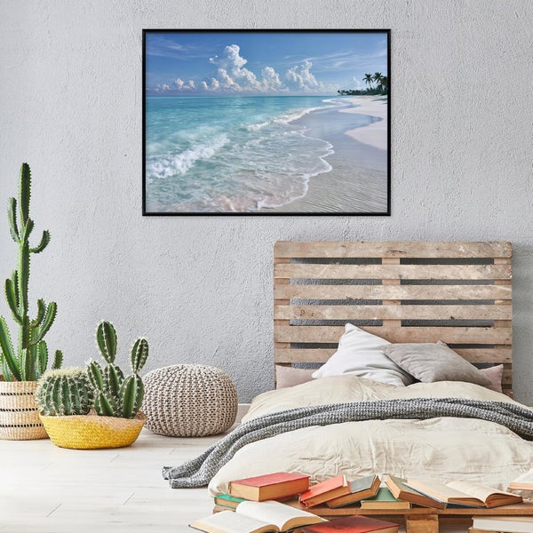 Wandbild mit Strandmotiv in einem Schlafzimmer mit Palettenbett, Kakteen und Stapeln von Büchern.