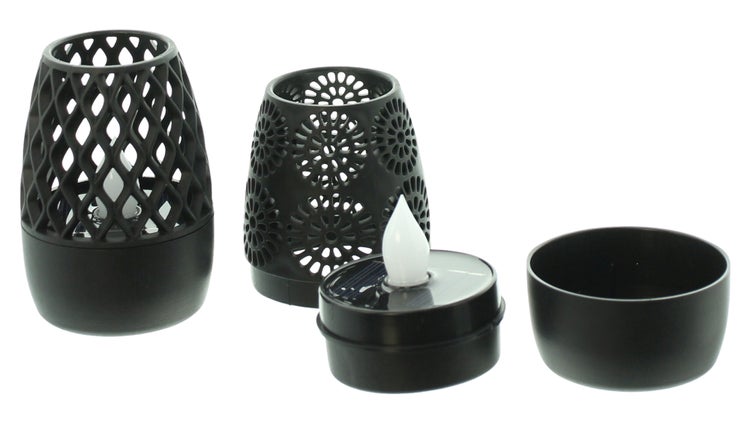 Dekorative Solarlampe mit LED Kerze und verschiedenen Aufsätzen.
