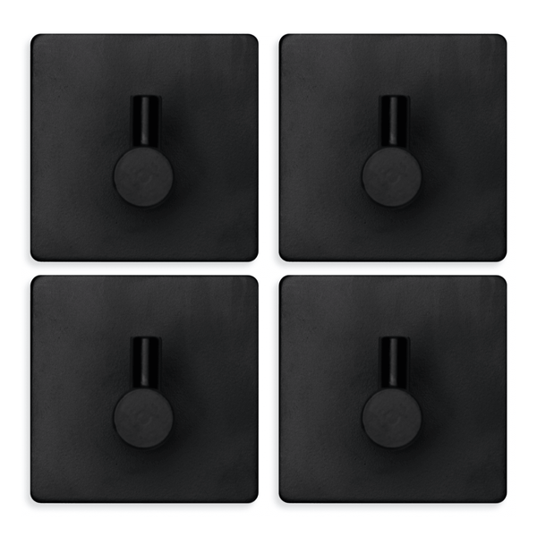 Vier schwarze selbstklebende Haken