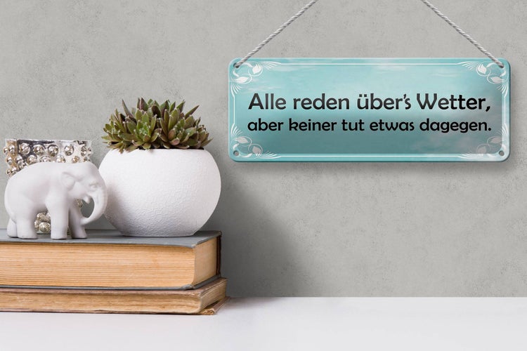 Blechschild Spruch 27x10cm alle reden über`s Wetter aber Dekoration