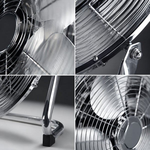 Detailansicht eines Bodenventilators aus Metall mit verchromtem Schutzgitter, Rotorblättern und stabilen Standfüßen.