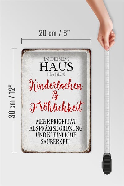 Blechschild Spruch 20x30cm in diesem Haus Kinderlachen