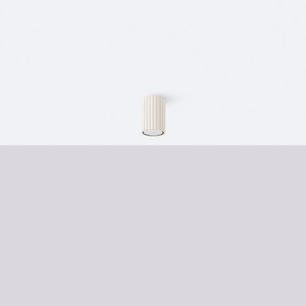 Zylinderförmige Deckenleuchte mit gerippter Oberfläche