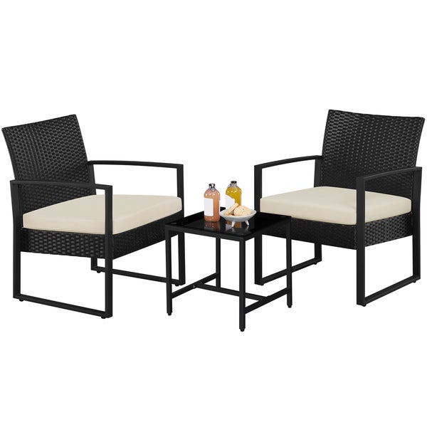 Gartenmöbelset mit zwei Korbsesseln, Sitzkissen und einem Tisch