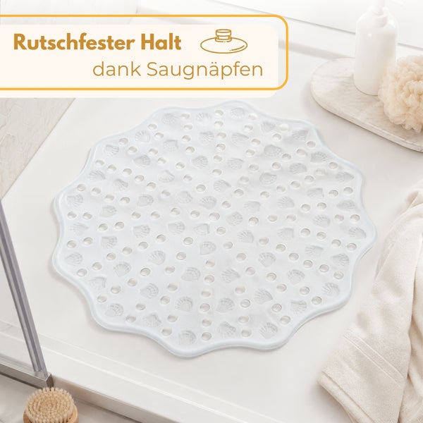 Runde, rutschfeste Wanneneinlage mit Muschel-Dekor, Drainage-Löchern und Saugnäpfen für sicheren Halt in Dusche oder Badewanne.